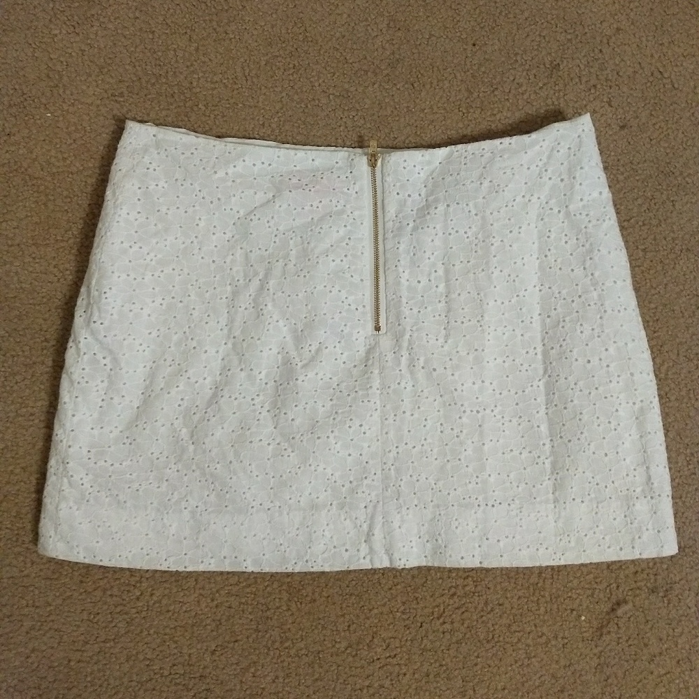 White eyelet mini skirt. So cute